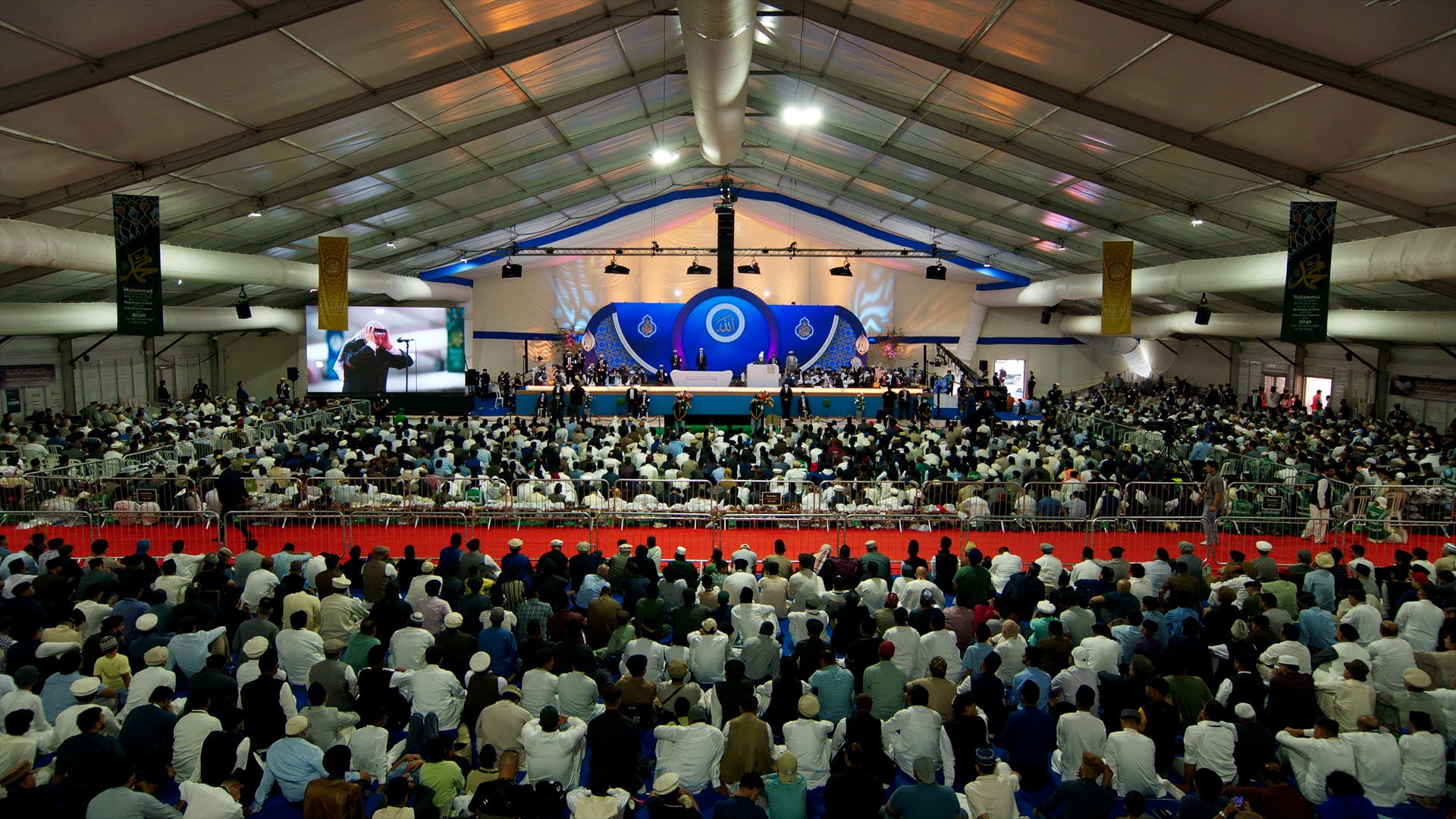 His Holiness Hazrat Mirza Masroor Ahmad inaugurates the 60th Annual Jalsa Salana as thousands gather in the United Kingdom.