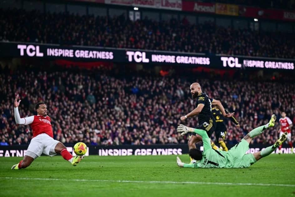 Manchester United fans at Old Trafford reacting to season ticket account restrictions