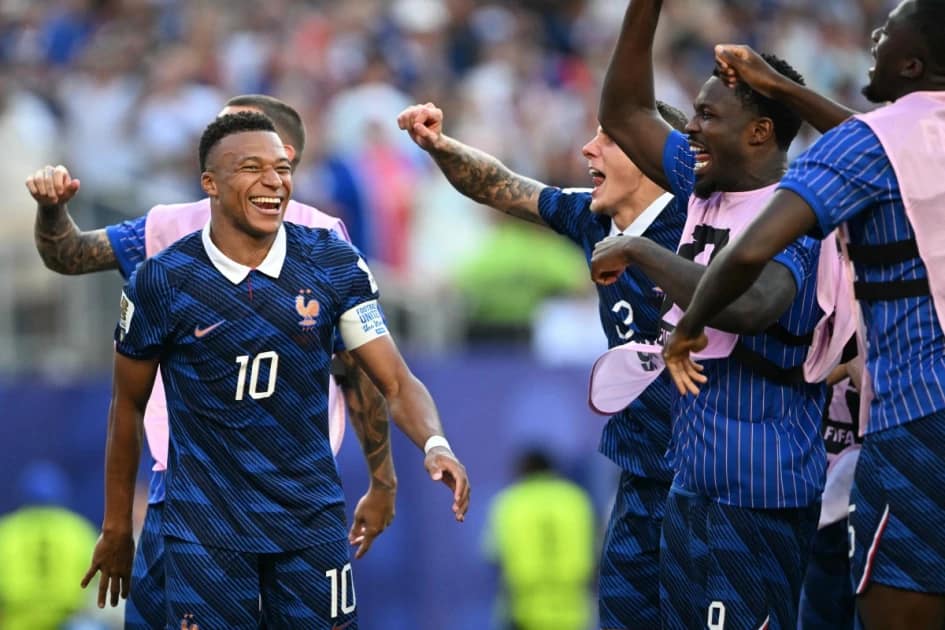 France's forward Kylian Mbappe celebrates with teammates after winning the 2026 World Cup round of 16 football match between Paraguay and France at the Philadelphia Stadium in Philadelphia on July 4, 2026. (Photo by MAURO PIMENTEL / AFP)