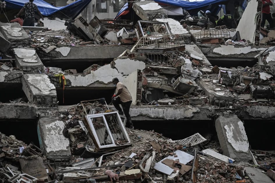 Rescue workers searching through collapsed buildings after the Venezuela earthquakes